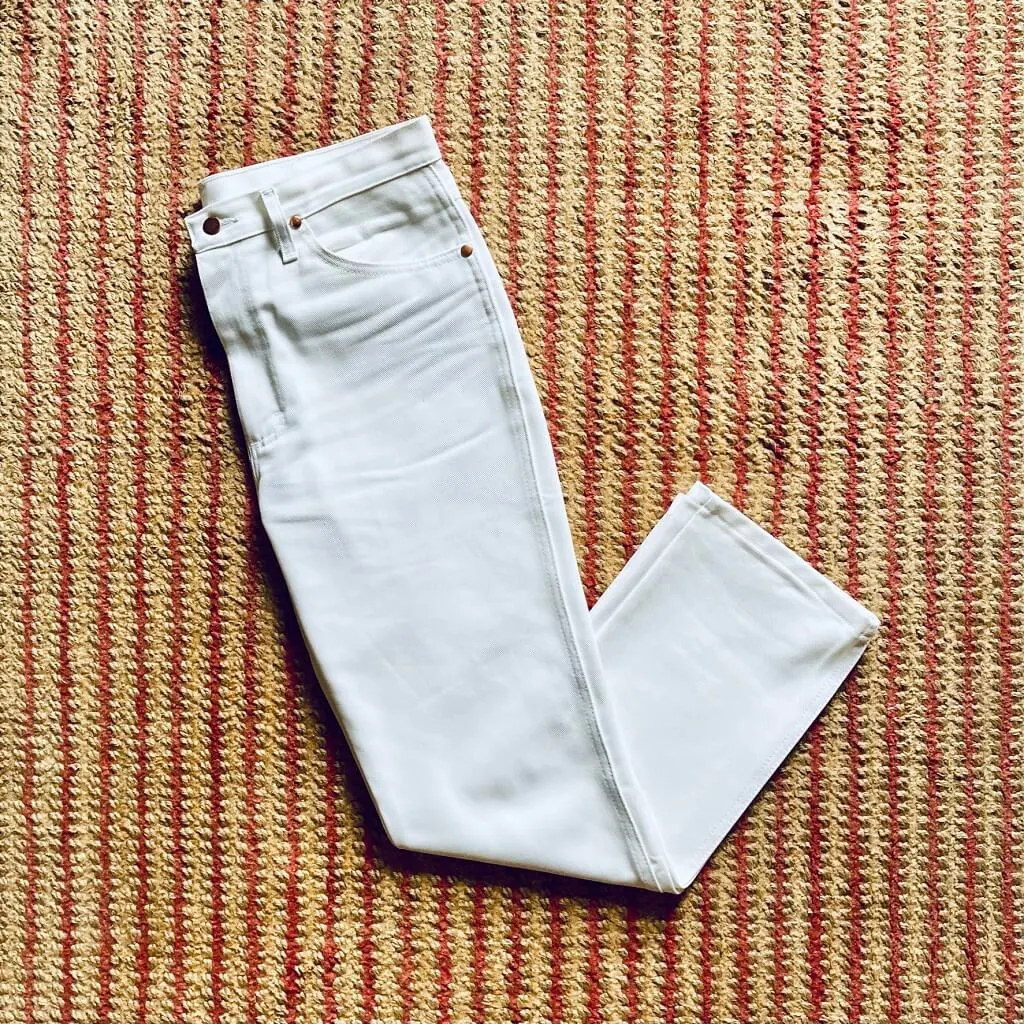 Flat-lay-of-a-pair-of-white-jeans
