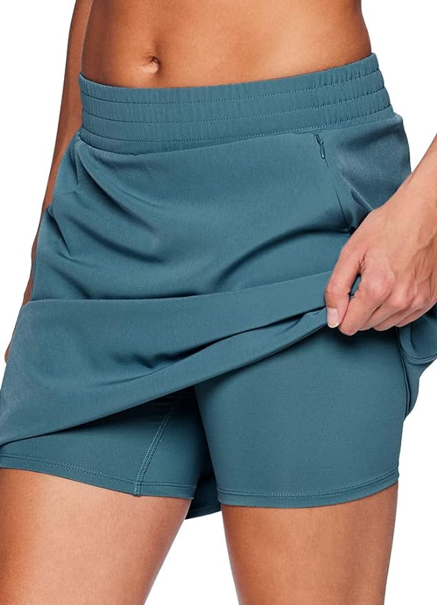 RBX Active Women's Golf Tennis Everyday Casual Athletic Skort with Bike Shorts detail from Amazon